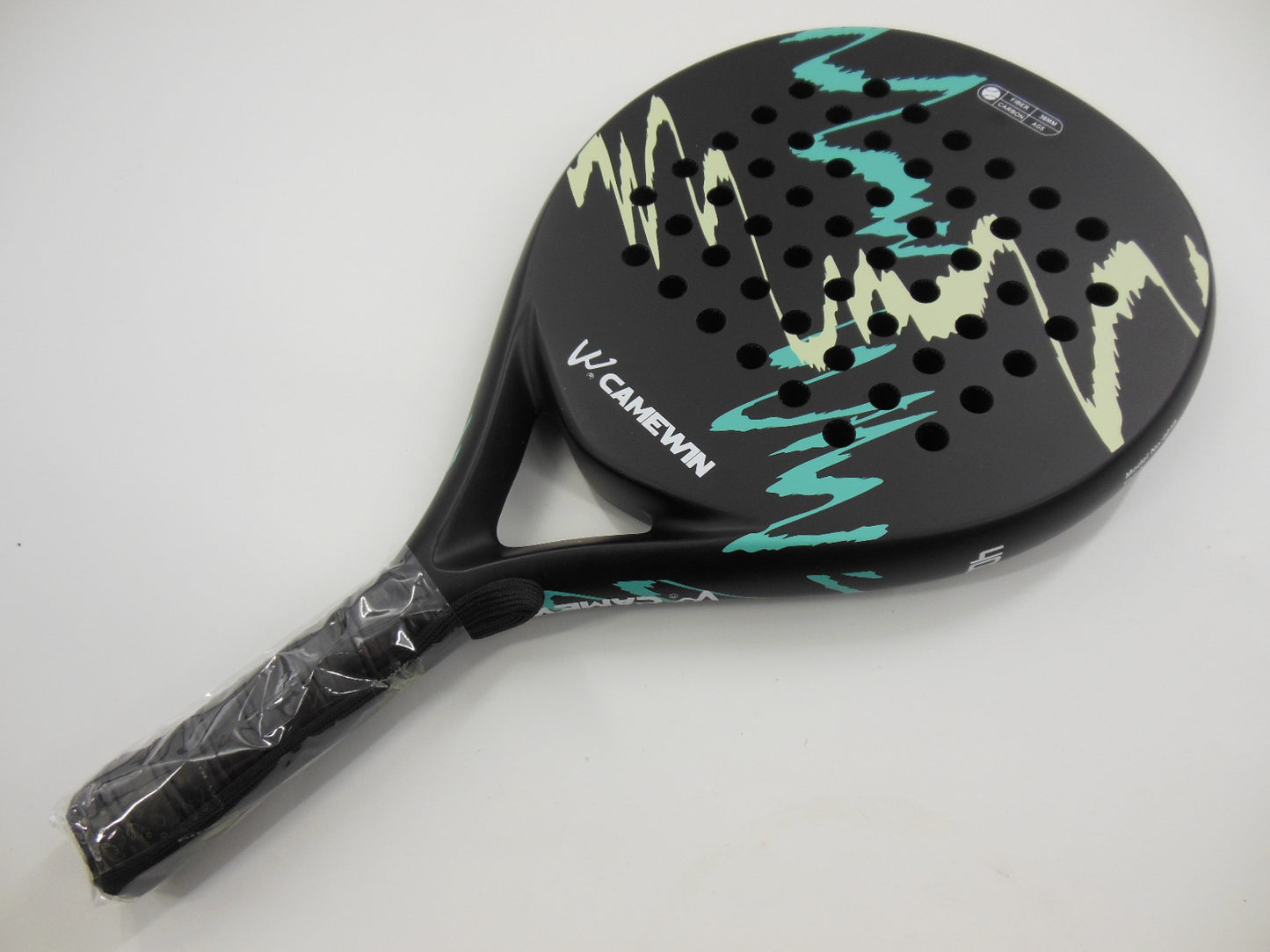 Presura carbon beach tennis racket in green with perforated face
