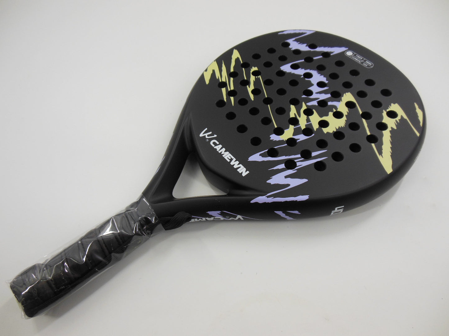 Presura carbon beach tennis racket in purple with textured hitting face