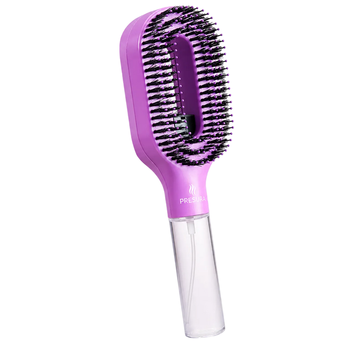 A purple pet grooming brush with black bristles and a clear plastic spray bottle attachment, shown on a checkered transparency background.