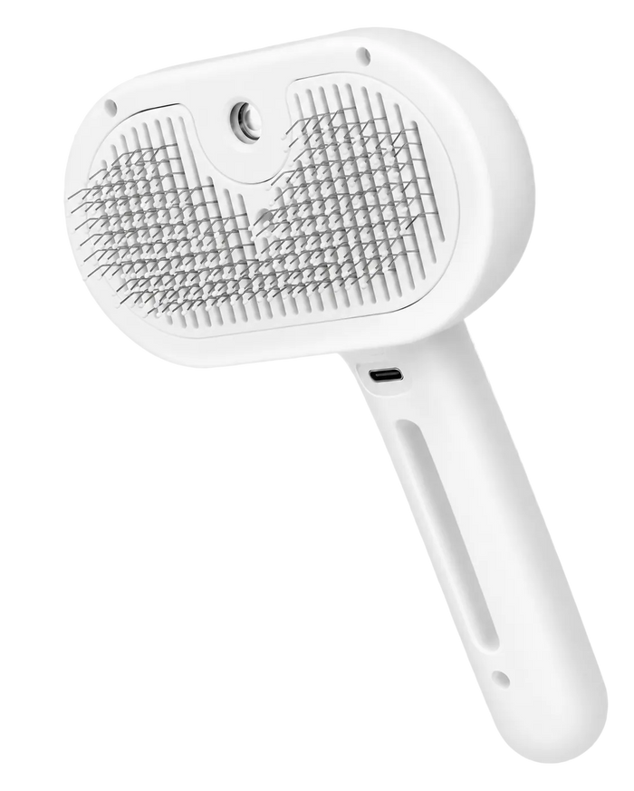 A white pet grooming brush with metal bristles, shown on a transparent checkerboard background.